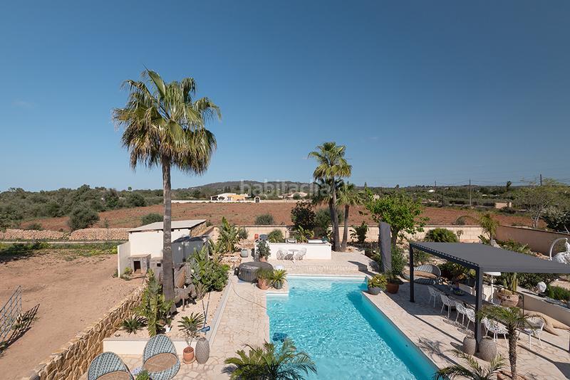 Foto 3a717494-6e34-493c-808b-6de1356ac4d1. Casale con camino riscaldamento parcheggio piscina in Llucmajor