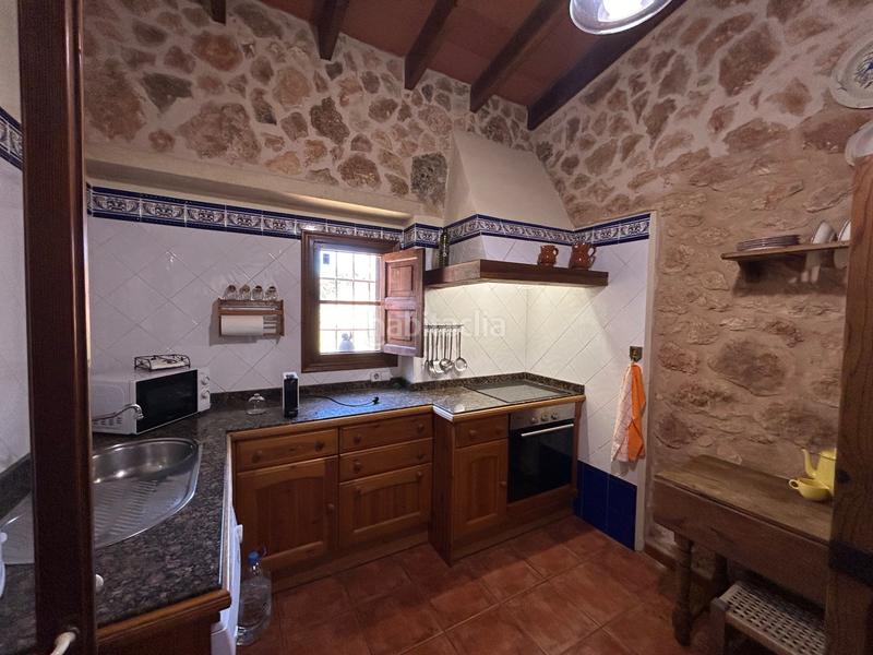 Foto fe1005da-1c09-4e67-bf30-7eba1cd3e913. Country house with heating in Llucmajor interior Llucmajor