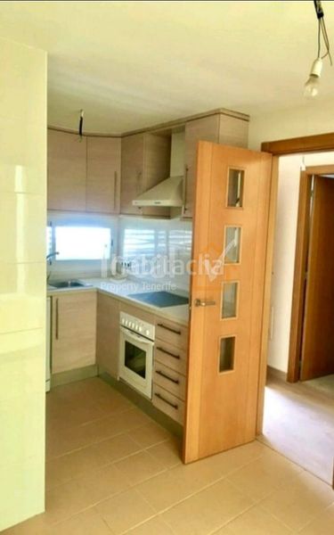 Foto c72cb0bb-8120-4204-abb5-2d4a48a7c971. Casa adossada amb aparcament piscina a Playa Fañabé Alto Adeje