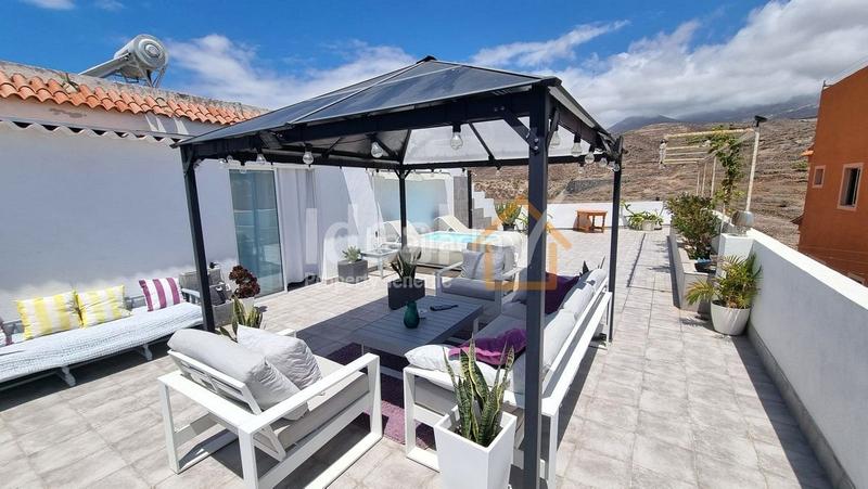 Foto 21de5a24-5094-41a6-8a8b-fda91af9e59c. Casa  unifamiliar con jardín en una zona tranquila de marazul en Adeje