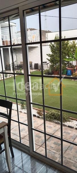 Foto c6261bc8-f72b-49c9-b61e-12302aeca259. Maison dans Buzanada Arona