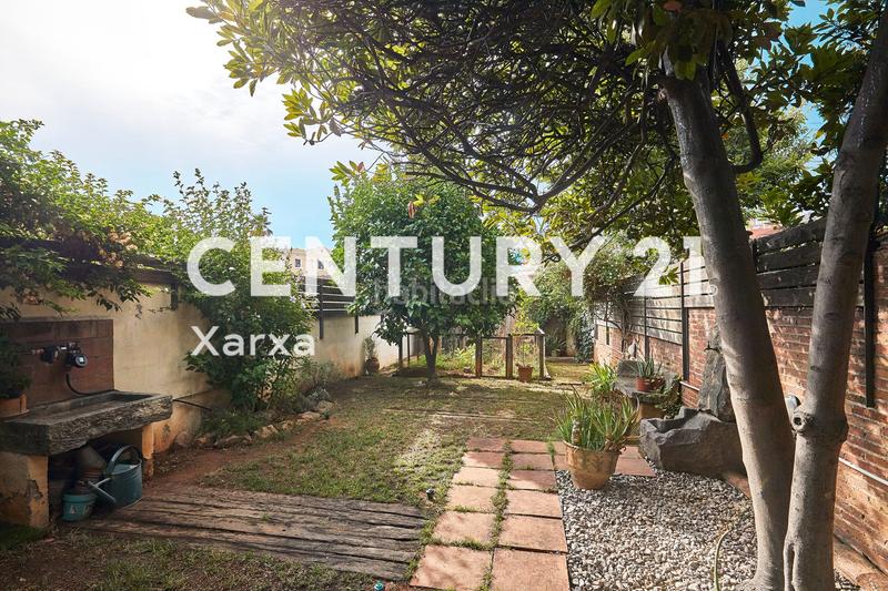 Foto 685417f9-239c-4479-83af-8bb3f759f28d. Casa a schiera con camino riscaldamento in Horta Barcelona