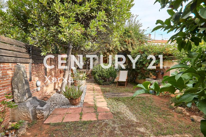 Foto 6c7ef3bf-7bf0-40cb-9a26-386043e8ca4a. Casa a schiera con camino riscaldamento in Horta Barcelona