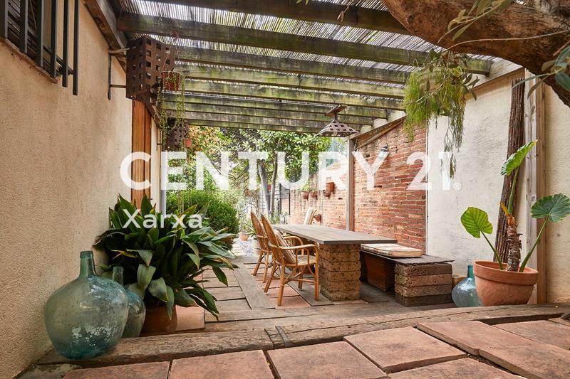 Foto b28725b7-8043-4d99-a326-5916dd5e5f6f. Casa a schiera con camino riscaldamento in Horta Barcelona