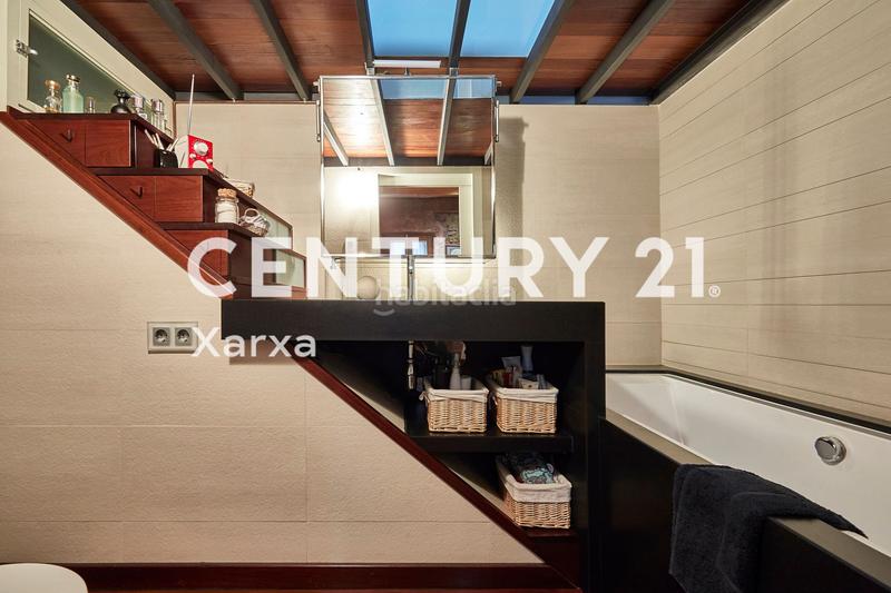 Foto c10fb911-6728-49ab-a21f-f5149fd74bd3. Casa a schiera con camino riscaldamento in Horta Barcelona