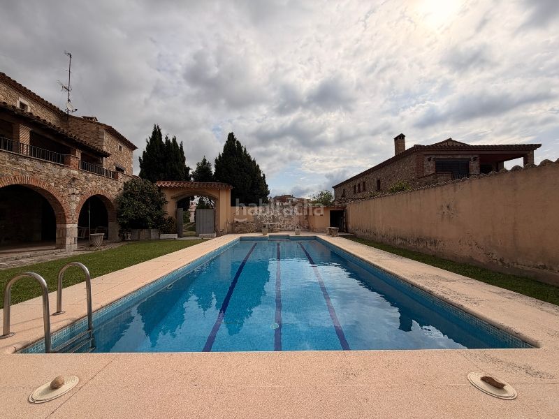 Foto 5b2a67b5-d59a-4db2-9ece-556f864a5e82. Casa amb xemeneia aparcament piscina a Castelló d´Empúries