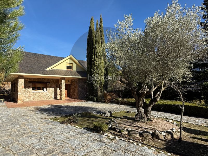 Foto 14fd5391-e575-458d-89b2-9b23cd536301. Chalet avec cheminée chauffage dans Navacerrada