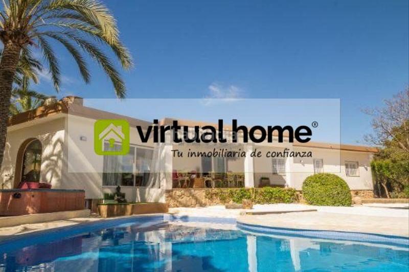 Foto 0bfd1bbc-370b-459f-8271-12fd6012db52. Chalet con parcheggio piscina in L´Albir Alfàs del Pi (l´)