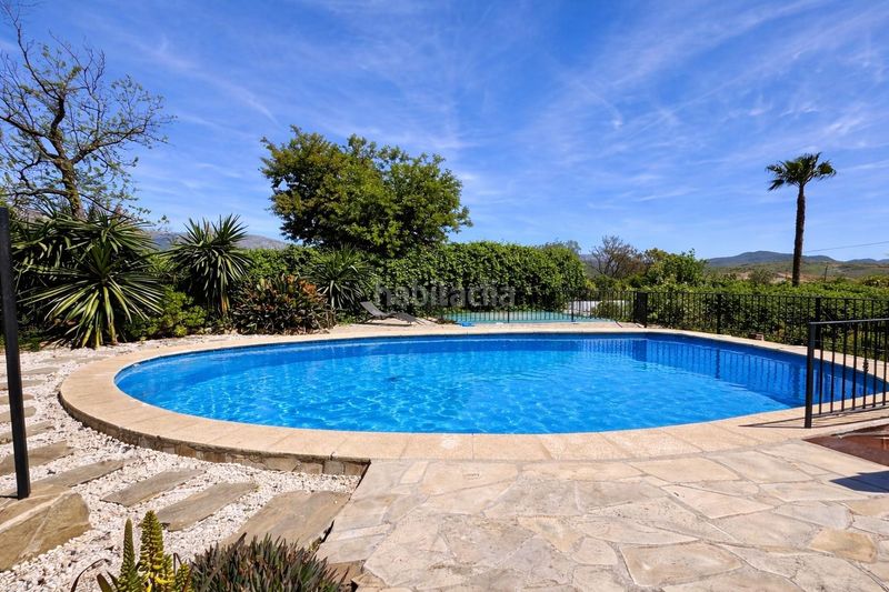 Foto ad6a8594-f1d9-49a3-a752-473f7b7d3744. Casa amb calefacció aparcament piscina a Álora