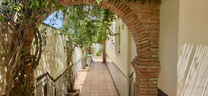 Foto 36cef22f-4938-4d1d-afa2-8b9e0ecce58f. Chalet  independiente en venta en urbanización arenal, parcela 1.000 m, planta baja, piscina y garaje en Alhendín