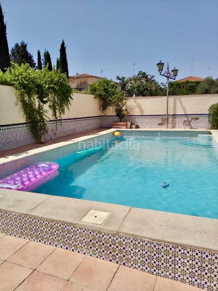Foto 01e073ef-1cd8-4637-8fc3-39447288b342. Chalet  independiente en venta en urbanización arenal parcela urbana de 1.000 m, todo en una planta, piscina y garaje en Alhendín