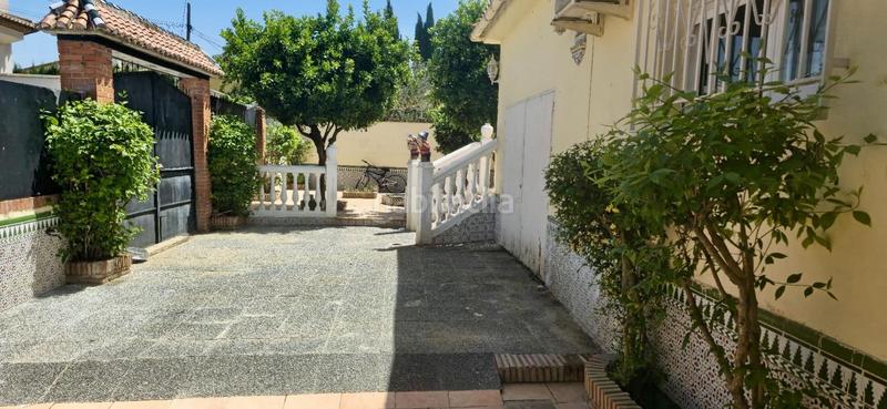 Foto 0ccfae3b-256d-4005-bd5a-3984317a54d4. Chalet  independiente en venta en urbanización arenal parcela urbana de 1.000 m, todo en una planta, piscina y garaje en Alhendín