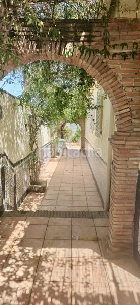 Foto 793f6a27-ef59-4cbc-863a-49ce7f83cb5d. Chalet  independiente en venta en urbanización arenal parcela urbana de 1.000 m, todo en una planta, piscina y garaje en Alhendín