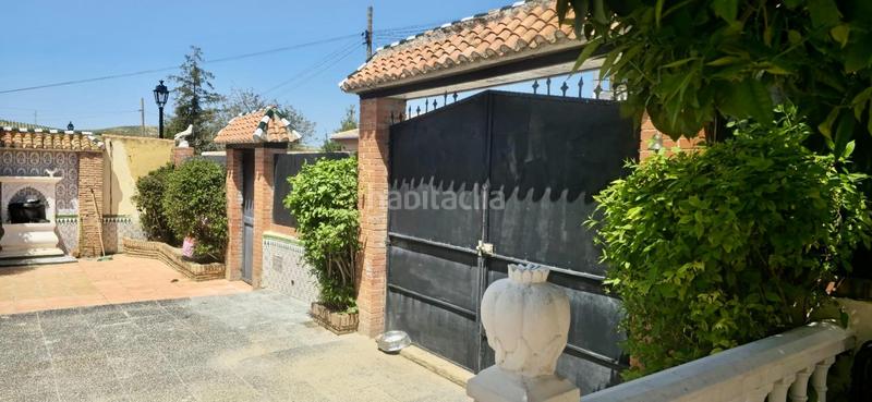 Foto a5dcd47f-22bb-4287-aec0-44323293f4a3. Chalet  independiente en venta en urbanización arenal parcela urbana de 1.000 m, todo en una planta, piscina y garaje en Alhendín