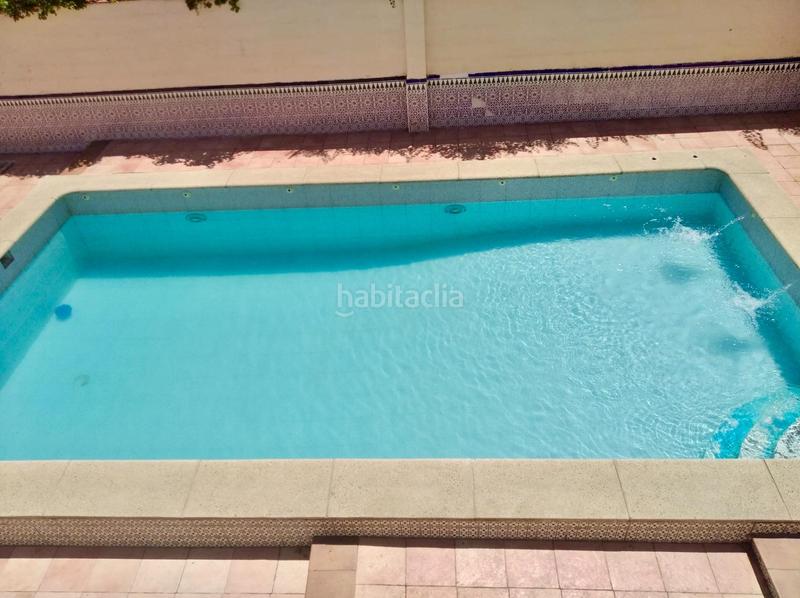 Foto c8309d0e-4c3b-4e8d-9cf6-d38e9b79756e. Chalet  independiente en venta en urbanización arenal parcela urbana de 1.000 m, todo en una planta, piscina y garaje en Alhendín