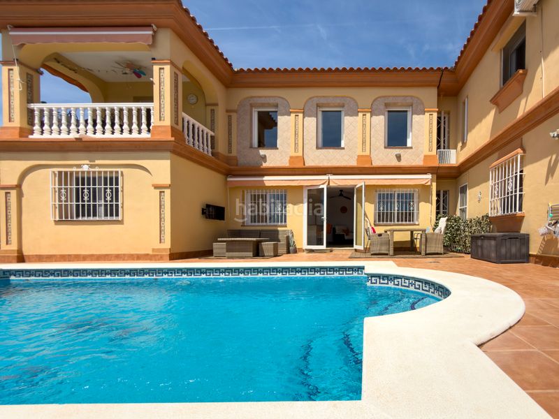 Foto f59bfa7e-ec1a-4fe5-8712-5ccf3b33d6fe. Xalet amb aparcament piscina a Coín