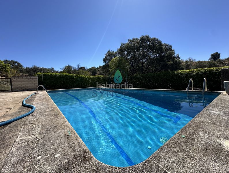 Foto fedd8260-ed42-4b34-86f7-86ee2bd88bbc. Xalet amb xemeneia calefacció aparcament piscina a Valdemorillo