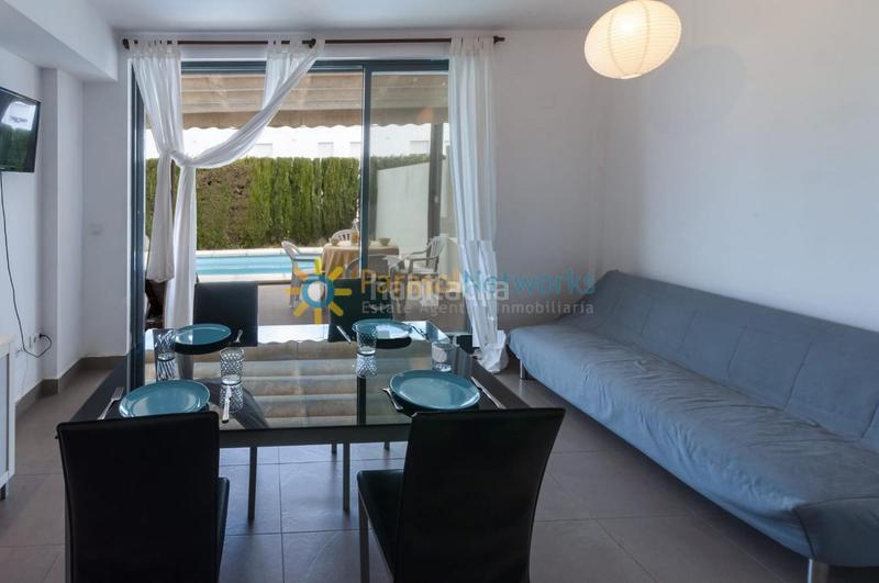Foto e6248d89-ca6c-4021-bffb-44fe6b8c9022. Rent semi detached house with parking pool in Oliva nova Oliva