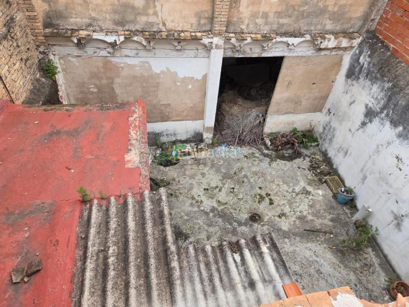 Foto 188be84d-ed1d-4313-9ec5-ac7dd64390cb. Casa aparellada amb xemeneia a Alcàntera de Xúquer