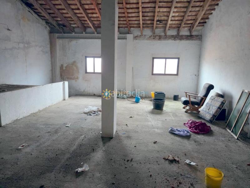 Foto 27d41a31-b0d9-4ef9-b7e8-c283bd299c8b. Casa aparellada amb xemeneia a Alcàntera de Xúquer