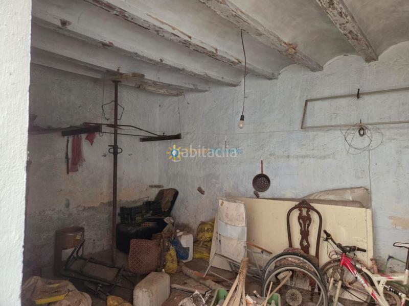 Foto 544d0974-d367-4214-9bf7-83a11c56cf88. Casa aparellada amb xemeneia a Alcàntera de Xúquer