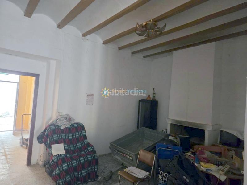 Foto 5aba0b35-efc7-4fd3-ba1f-0b610bf09a6a. Casa aparellada amb xemeneia a Alcàntera de Xúquer