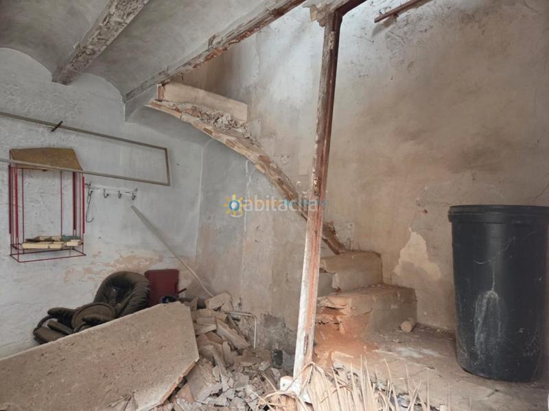 Foto 6b54e7f9-097b-4dbe-b511-204beecc4296. Casa aparellada amb xemeneia a Alcàntera de Xúquer