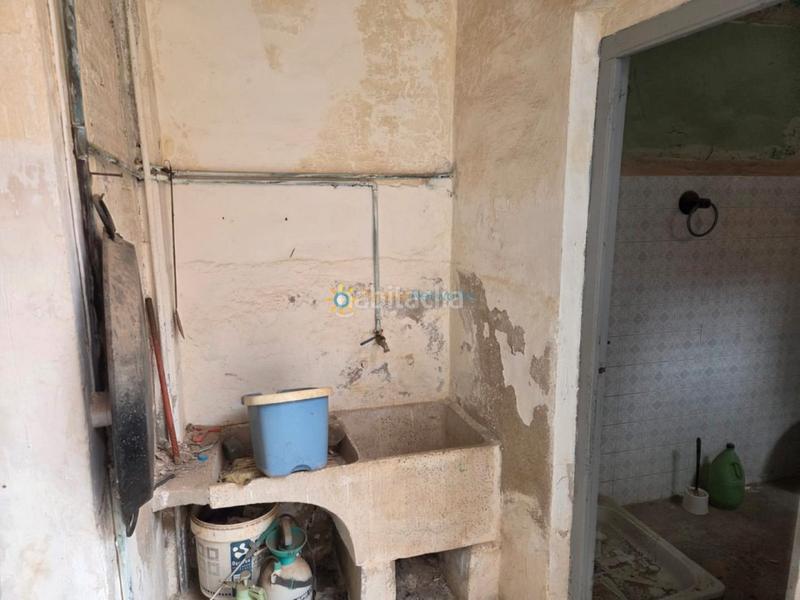 Foto 9268ca43-6a34-4a3b-a56b-85850eadb90c. Casa aparellada amb xemeneia a Alcàntera de Xúquer