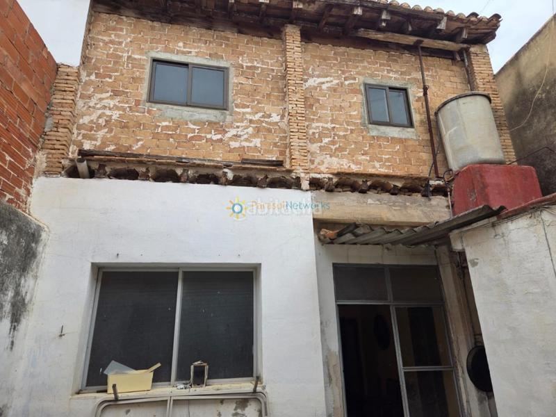 Foto 2d8b54c7-1e25-45ac-825c-2c04be5b53f4. Casa aparellada a Alcàntera de Xúquer