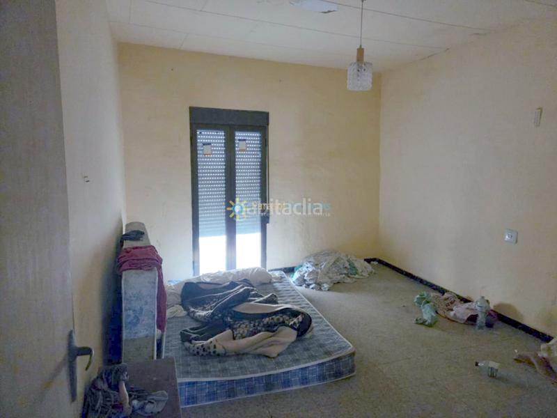 Foto 70a8a30c-e976-4f66-ac74-1f5a5785847d. Casa aparellada a Alcàntera de Xúquer