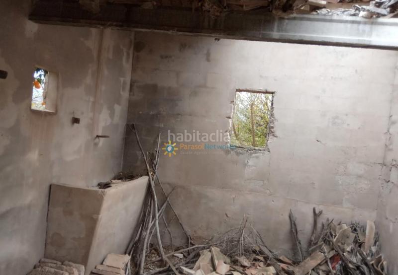 Foto 3da60d90-02b3-4bc8-b4aa-7e53c656a226. Rural plot in Pego