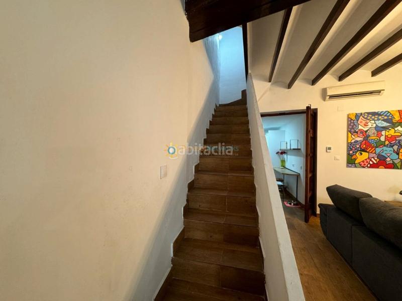 Foto 3b47456f-0b01-48f9-b822-9ea67699392c. Casa aparellada amb xemeneia a Oliva pueblo Oliva