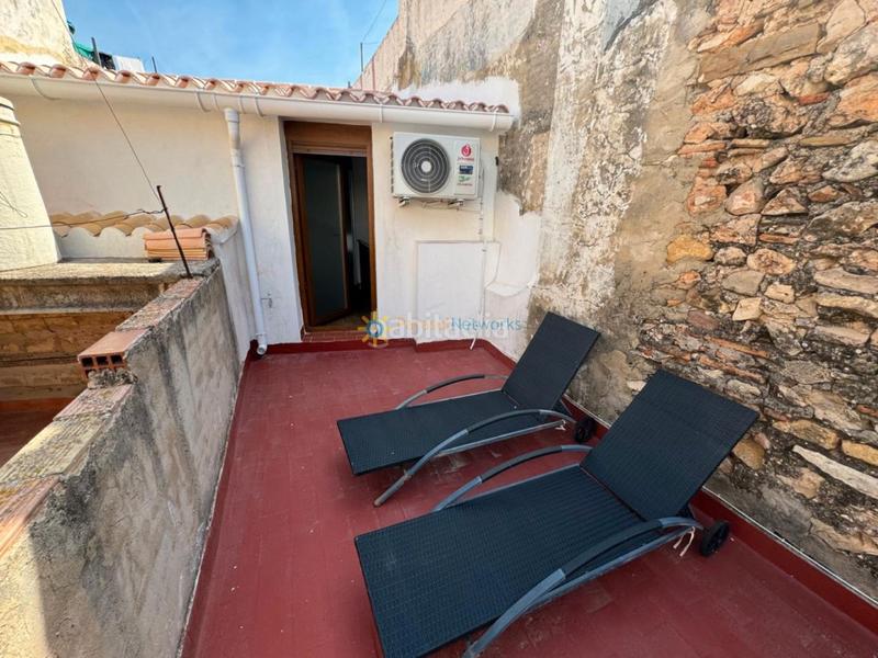 Foto 6688ffaf-fa7c-4b53-a5a3-2a601503b345. Maison jumelée avec cheminée dans Oliva pueblo Oliva