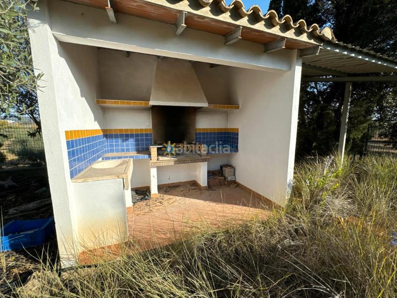 Foto 9834f881-fd9b-40f0-8bed-62fed69a597b. Masia amb xemeneia aparcament a Palomar