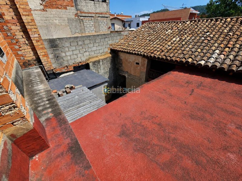 Foto 8dc9d0e9-08be-49be-8eba-98471d3b8cbb. Casa aparellada amb xemeneia a Sellent