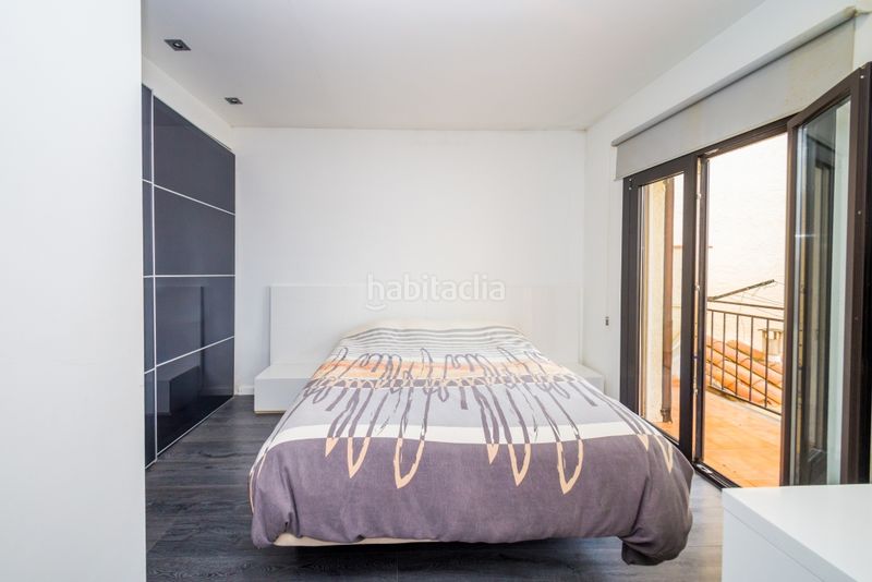 Foto f975e117-ad8e-4500-84e0-0ce13e9c6dc7. Àtic amb xemeneia calefacció a Poble Calonge