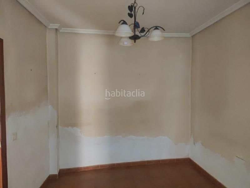 Foto 7948fb90-db6c-49e3-beef-fc3809a1820c. Casa  adosada en calle álamo, en Bailén