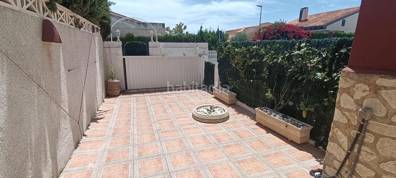 Foto 582eaaa5-ff9e-4e7f-af3d-7dcf24a11ff6. Casa adossada amb calefacció aparcament piscina a Nucia (la)