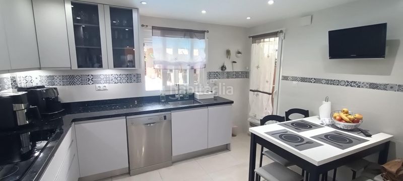 Foto c13fc2ee-adab-4353-9d53-913c247304ad. Casa adossada amb calefacció aparcament piscina a Nucia (la)
