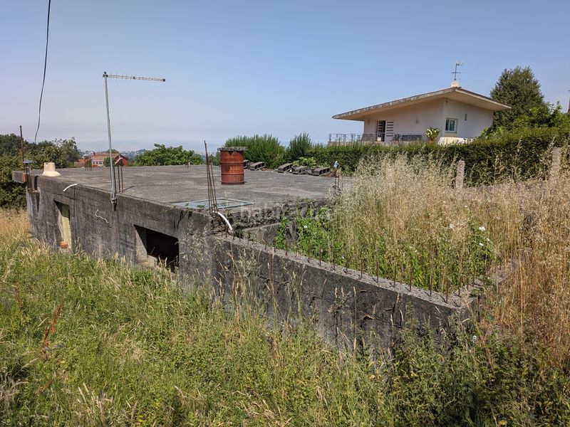 Foto d10ff13a-89f5-448c-b438-918caae686b0. Terreno residencial parcela edificable con construcción en planta baja en Vigo