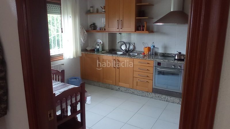 Foto 8a98c05c-ac2e-4115-8a75-9ad5b44f0077. Casa amb xemeneia calefacció a Lavadores Vigo