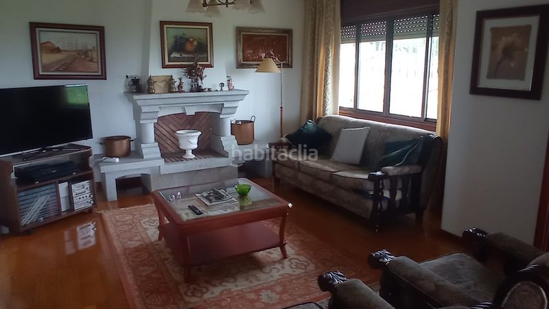 Foto c9e71f2c-c8fd-4d45-8152-ba211984bf9f. Casa amb xemeneia calefacció a Lavadores Vigo