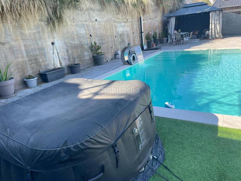 Foto 10e1c058-884c-4ddc-b7b5-1d32063fc2e0. Casa amb calefacció aparcament piscina a Lliçà d´Amunt