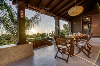 Casa a Puig d´en Valls. Casa de lujo de 460 m2 con piscina y vistas en venta en es caló