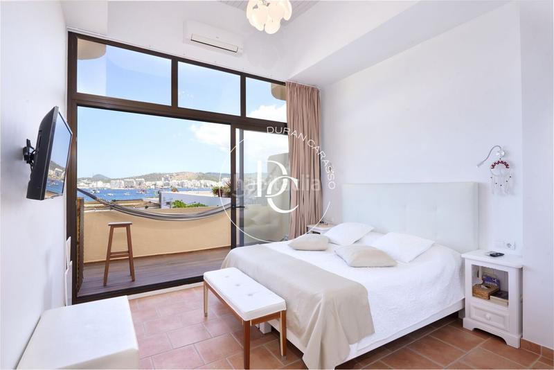 Foto 7e12ddad-85a3-4f2e-84db-acb98fc78383. Piso  de 82 m2 con piscina, vistas y terraza en venta en Sant Josep de sa Talaia