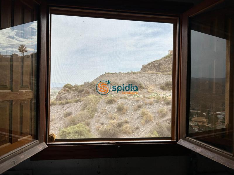 Foto 106f9cb0-0e2b-45f4-81ca-854843d5b420. Chalet  independiente en la parte alta de todosol con excelentes vistas, piscina, jardín y huerto en Águilas