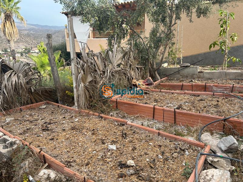 Foto 3a6eda28-3d49-4fd2-a8f1-99cdcea53c6e. Chalet  independiente en la parte alta de todosol con excelentes vistas, piscina, jardín y huerto en Águilas