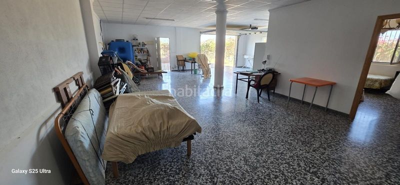 Foto c89d1d5d-ee1d-4988-9af6-d09f180f8e9b. Masia amb calefacció aparcament a Águilas
