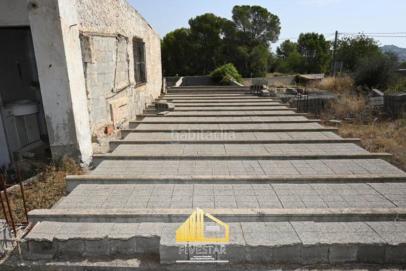 Foto 80f151dd-92be-49b6-a688-dcc010d79f00. Terreno residencial en les travesses parcela con construccion en lliria en Llíria