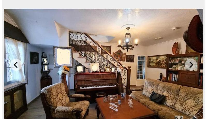 Foto 39b86294-a693-4b7c-923d-b279cc5c703e. Chalet in constitucion 34 in Carracedelo